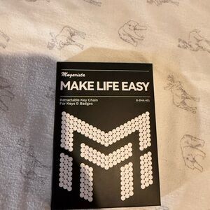 Retractable key chains. New.